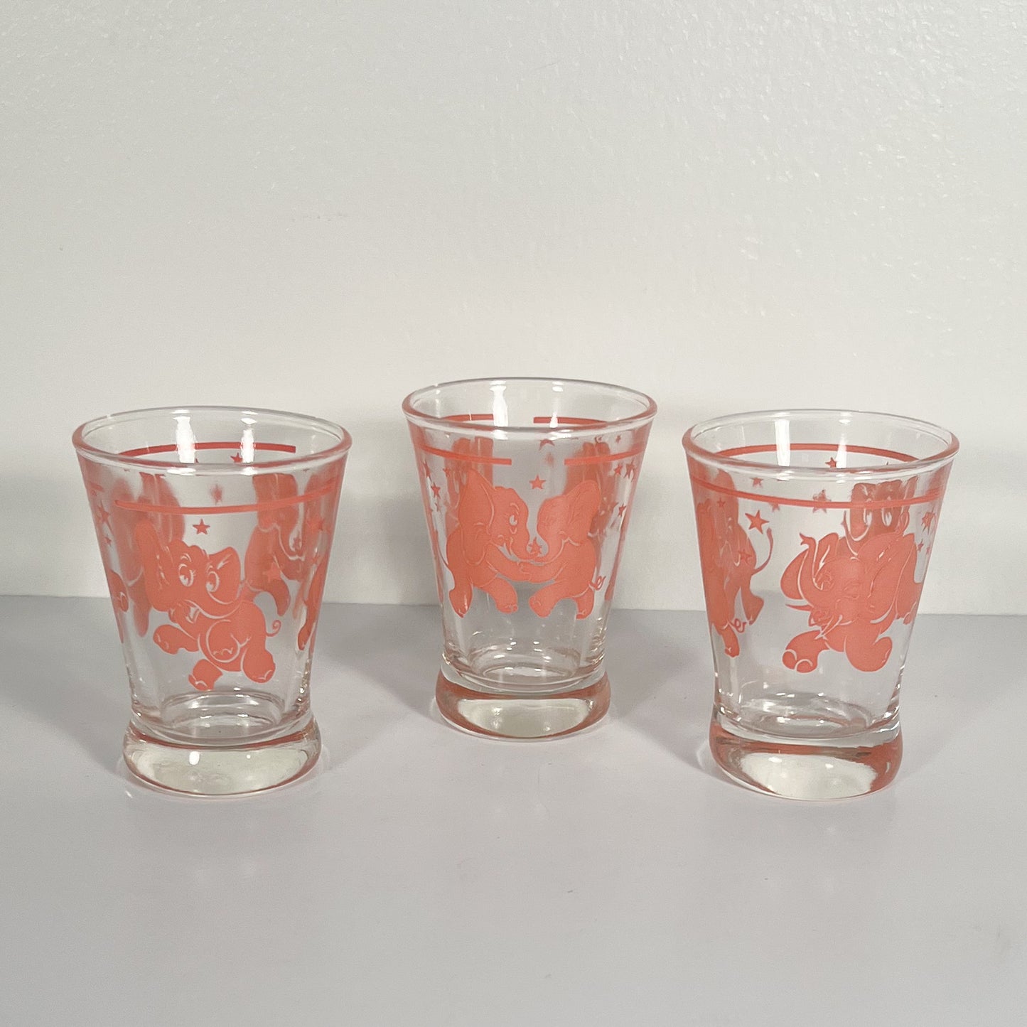 (24825) Midcentury Seeing Pink Elephants Shaker and Set of Six Glasses