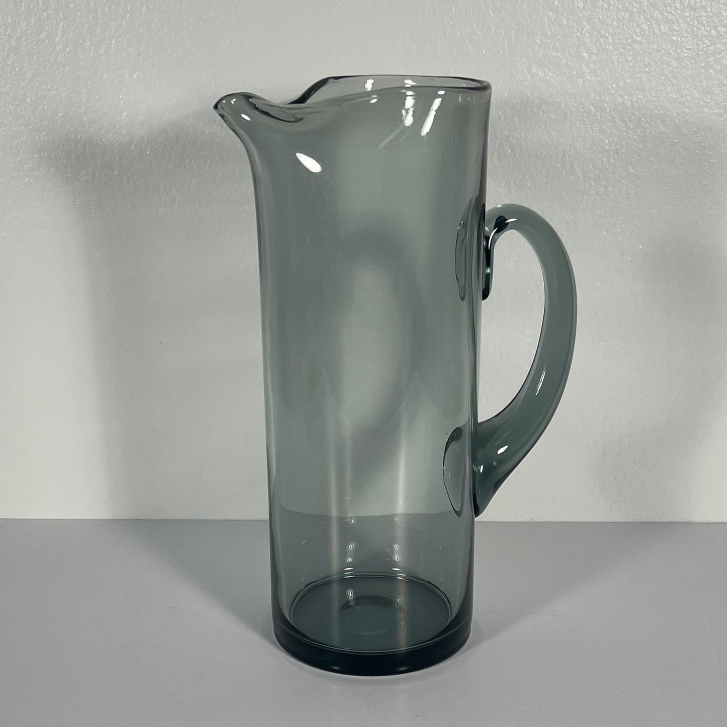 (19911) Midcentury Smoky Gray Pitcher and Four Footed Glasses